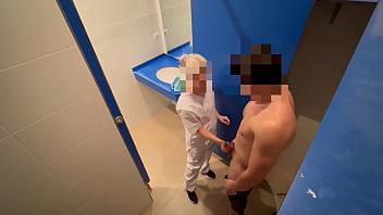 I surprise the gym cleaning woman who when she comes in to clean the toilet she catches me wanking off and helps me complete jizzing with a blow-job