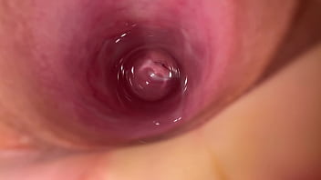 Camera deep inside Mia's nubile fluid colored vulva