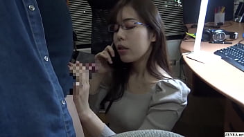 Japanese cuckold on phone with spouse while giving blow-job